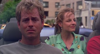 Movie still from “As Good as It Gets” (1997), directed by James L. Brooks – A man and a woman are standing next to each other; Close Up shot, Low angle