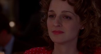 Movie still from “As Good as It Gets” (1997), directed by James L. Brooks – A person wearing a red shirt; Close Up shot, Over the shoulder angle