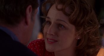 Movie still from “As Good as It Gets” (1997), directed by James L. Brooks – A woman's face as a man looks on; Close Up shot, Over the shoulder angle