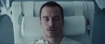 Movie still from “Assassin's Creed” (2016), directed by Justin Kurzel – A person with his eyes closed; Close Up shot, Overhead angle