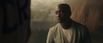 Movie still from “Assassin's Creed” (2016), directed by Justin Kurzel – A man with a beard is looking into the distance; Close Up shot, Low angle