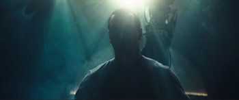 Movie still from “Assassin's Creed” (2016), directed by Justin Kurzel – A man is standing in the sunlight in a room; Close Up shot, Low angle
