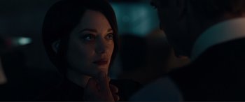 Movie still from “Assassin's Creed” (2016), directed by Justin Kurzel – A person with her hand on her chin; Close Up shot, Over the shoulder angle