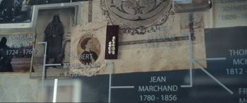Movie still from “Assassin's Creed” (2016), directed by Justin Kurzel – A wall with a bunch of pictures on the wall; Extreme Close Up shot, Overhead angle