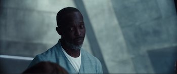 Movie still from “Assassin's Creed” (2016), directed by Justin Kurzel – A man with a beard is looking into the distance; Close Up shot, Over the shoulder angle