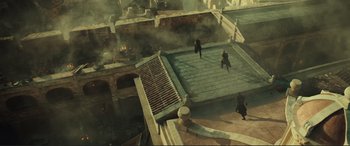 Movie still from “Assassin's Creed” (2016), directed by Justin Kurzel – A group of people on top of a building; Extreme Wide shot, High angle