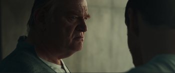Movie still from “Assassin's Creed” (2016), directed by Justin Kurzel – An older man with a white beard looking to his left; Close Up shot, Low angle