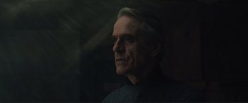 Movie still from “Assassin's Creed” (2016), directed by Justin Kurzel – An older man is looking into the distance; Close Up shot, Low angle