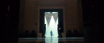 Movie still from “Assassin's Creed” (2016), directed by Justin Kurzel – A man is walking through a door way; Extreme Wide shot, Low angle