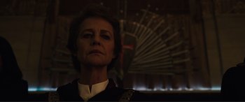 Movie still from “Assassin's Creed” (2016), directed by Justin Kurzel – An older woman is looking into the camera; Close Up shot, Low angle