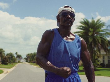 Movie still from “Some Kind of Heaven” (2020), directed by Lance Oppenheim – Medium shot, Low angle