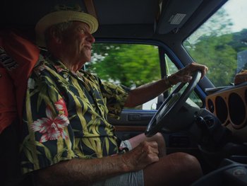 Movie still from “Some Kind of Heaven” (2020), directed by Lance Oppenheim – Medium shot, Low angle