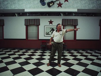 Movie still from “Some Kind of Heaven” (2020), directed by Lance Oppenheim – Wide shot, Low angle