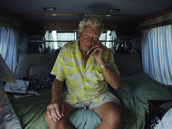 Movie still from “Some Kind of Heaven” (2020), directed by Lance Oppenheim – Medium shot, Overhead angle