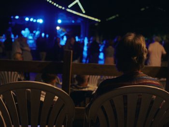 Movie still from “Some Kind of Heaven” (2020), directed by Lance Oppenheim – Wide shot, Over the shoulder angle