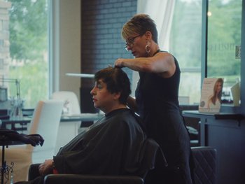 Movie still from “Some Kind of Heaven” (2020), directed by Lance Oppenheim – Medium shot, Over the shoulder angle