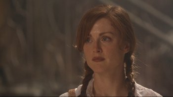 Movie still from “Assassins” (1995), directed by Richard Donner – A person with long hair; Close Up shot, Over the shoulder angle