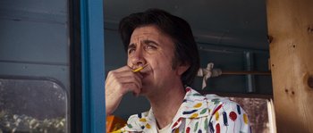 Movie still from “Assault on Precinct 13” (1976), directed by John Carpenter – A man with a toothbrush in his mouth; Close Up shot, Low angle