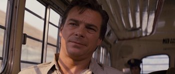 Movie still from “Assault on Precinct 13” (1976), directed by John Carpenter – A person wearing a brown shirt; Close Up shot, Low angle