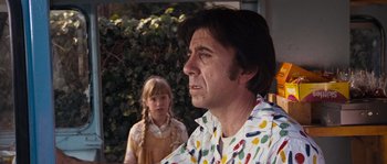 Movie still from “Assault on Precinct 13” (1976), directed by John Carpenter – A man and a little girl are standing in front of a building; Close Up shot, Over the shoulder angle