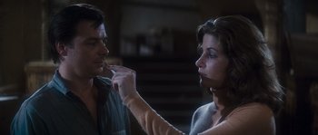 Movie still from “Assault on Precinct 13” (1976), directed by John Carpenter – A man and a woman looking at each other; Close Up shot, Over the shoulder angle