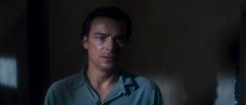 Movie still from “Assault on Precinct 13” (1976), directed by John Carpenter – A person wearing a blue shirt; Close Up shot, Low angle