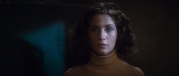 Movie still from “Assault on Precinct 13” (1976), directed by John Carpenter – A person with long hair; Close Up shot, Low angle