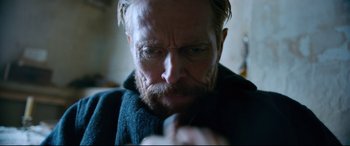 Movie still from “At Eternity's Gate” (2018), directed by Julian Schnabel – A person with a beard; Close Up shot, Low angle