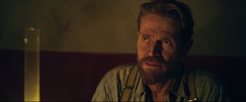 Movie still from “At Eternity's Gate” (2018), directed by Julian Schnabel – A person with a beard; Close Up shot, Over the shoulder angle