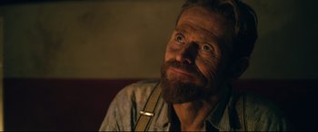 Movie still from “At Eternity's Gate” (2018), directed by Julian Schnabel – A person with a beard; Close Up shot, Over the shoulder angle