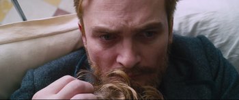 Movie still from “At Eternity's Gate” (2018), directed by Julian Schnabel – A person with a beard; Extreme Close Up shot, High angle