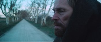 Movie still from “At Eternity's Gate” (2018), directed by Julian Schnabel – A person with a beard; Close Up shot, Over the shoulder angle