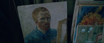 Movie still from “At Eternity's Gate” (2018), directed by Julian Schnabel – A painting of a man with a red beard; Close Up shot, Overhead angle