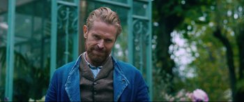 Movie still from “At Eternity's Gate” (2018), directed by Julian Schnabel – A person wearing a jacket; Close Up shot, Over the shoulder angle