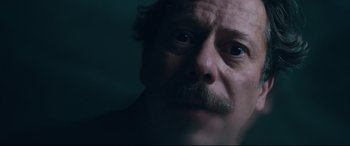 Movie still from “At Eternity's Gate” (2018), directed by Julian Schnabel – A person with a mustache; Close Up shot, Low angle