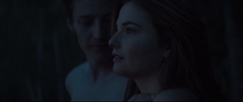 Movie still from “At First Light” (2018), directed by Jason Stone – A man and a woman looking at each other; Close Up shot, Over the shoulder angle