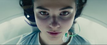Movie still from “At First Light” (2018), directed by Jason Stone – A person's eyes and face; Extreme Close Up shot, Overhead angle