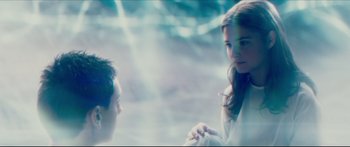 Movie still from “At First Light” (2018), directed by Jason Stone – A man and a woman are holding hands; Medium shot, Over the shoulder angle