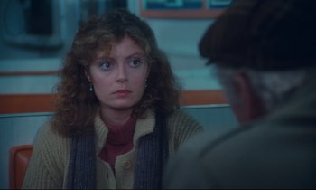 Movie still from “Atlantic City” (1980), directed by Louis Malle – A woman sitting in front of a man in front of a window; Close Up shot, Over the shoulder angle