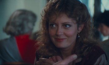 Movie still from “Atlantic City” (1980), directed by Louis Malle – A person with curly brown hair; Close Up shot, Over the shoulder angle