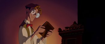 Movie still from “Atlantis: The Lost Empire” (2001), directed by Gary Trousdale – An animated person holding a book in front of a building; Close Up shot, Low angle