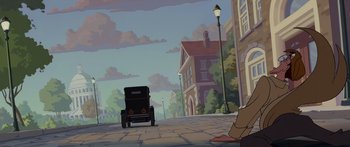 Movie still from “Atlantis: The Lost Empire” (2001), directed by Gary Trousdale – An old car is driving down the street; Wide shot, High angle