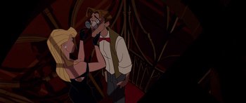 Movie still from “Atlantis: The Lost Empire” (2001), directed by Gary Trousdale – A couple of people that are standing in a room together; Medium shot, Over the shoulder angle