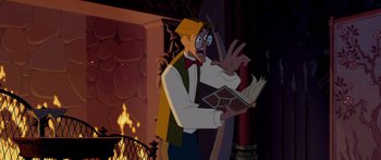 Movie still from “Atlantis: The Lost Empire” (2001), directed by Gary Trousdale – A man with a book in his hands; Medium shot, Over the shoulder angle