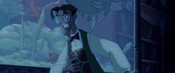 Movie still from “Atlantis: The Lost Empire” (2001), directed by Gary Trousdale – A man with a glass of wine in his hand; Medium shot, Low angle