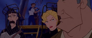 Movie still from “Atlantis: The Lost Empire” (2001), directed by Gary Trousdale – A woman with blonde hair and a black shirt; Medium shot, Over the shoulder angle