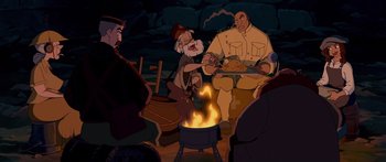 Movie still from “Atlantis: The Lost Empire” (2001), directed by Gary Trousdale – A group of people sitting around a fire pit; Wide shot, High angle