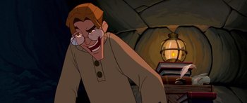Movie still from “Atlantis: The Lost Empire” (2001), directed by Gary Trousdale – A cartoon of a man with a joker face; Medium shot, High angle