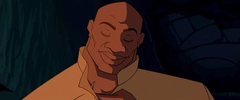 Movie still from “Atlantis: The Lost Empire” (2001), directed by Gary Trousdale – An animated picture of an african american man smiling; Close Up shot, High angle