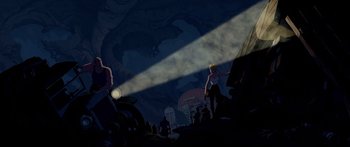 Movie still from “Atlantis: The Lost Empire” (2001), directed by Gary Trousdale – A group of people standing in the dark under a street light at night; Wide shot, Low angle